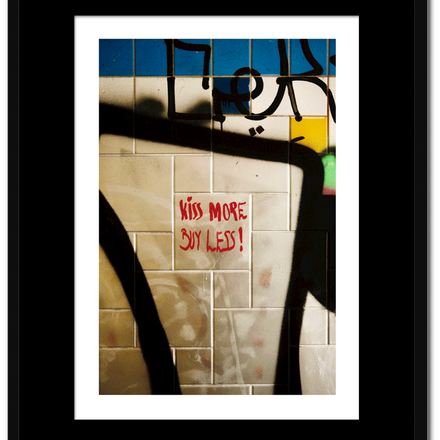 Kiss more buy less!